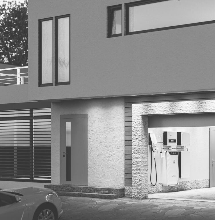 an apartment complex with garage and parking spot